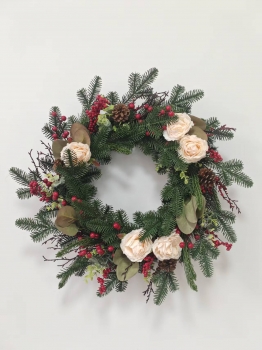 Christmas Wreath with Pine Needles, White Camellia Flowers, Red Berries and Pine Cones