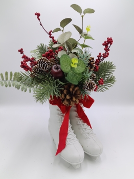 Artificial Christmas Arrangement with White Ice Skate Container, Red Bow, Pine Cones and Red Berries