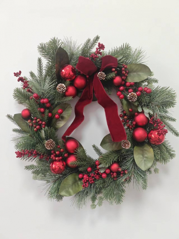 Christmas Wreath with Pine Needles, Magnolia Leaves, Red Baubles and Red Velvet Bow